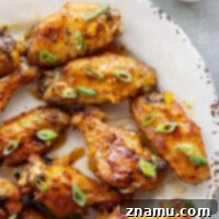 Sweet Heat Orange Wings 8 Oven baked to crispy perfection and tossed in a sweet and spicy orange hot honey sauce, these hot honey chicken wings are the ultimate game day appetizer!