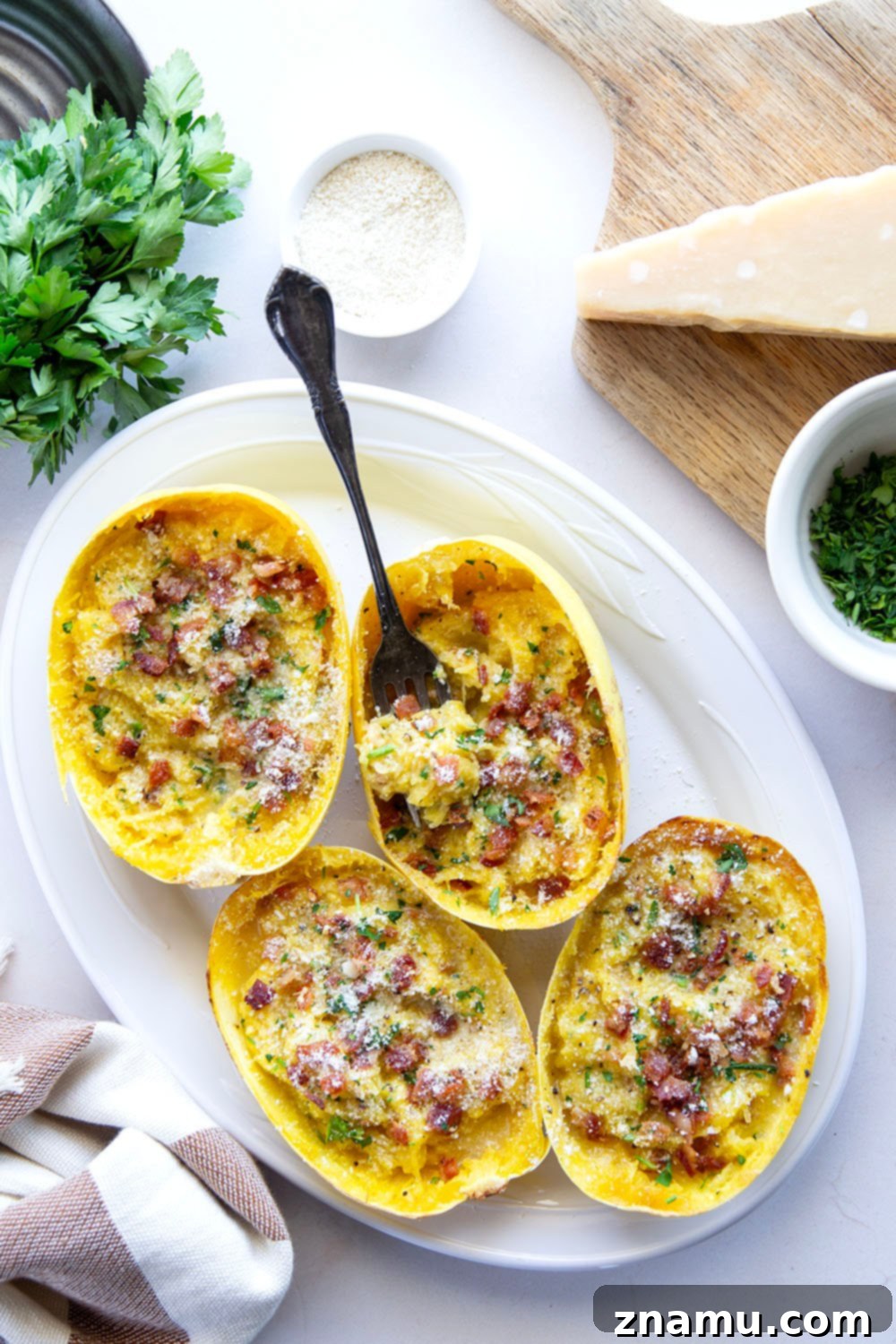 Creamy Spaghetti Squash Carbonara Boats 2 Made with tender roasted spaghetti squash in lieu of typical pasta, these spaghetti squash carbonara boats are rich, creamy, and loaded with lots of crispy bacon and fresh Parmesan!