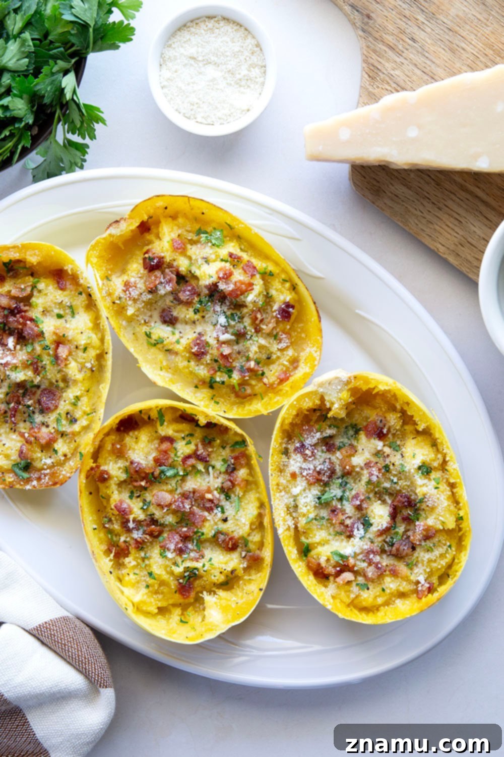 Creamy Spaghetti Squash Carbonara Boats 3 Made with tender roasted spaghetti squash in lieu of typical pasta, these spaghetti squash carbonara boats are rich, creamy, and loaded with lots of crispy bacon and fresh Parmesan!