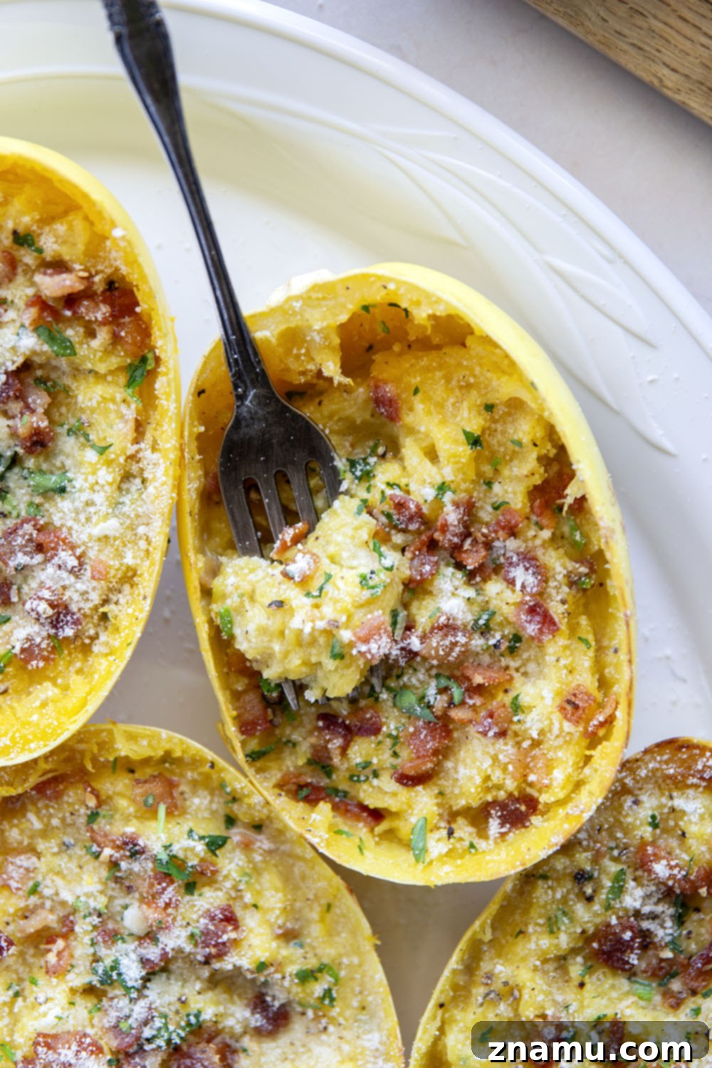 Creamy Spaghetti Squash Carbonara Boats 5 Made with tender roasted spaghetti squash in lieu of typical pasta, these spaghetti squash carbonara boats are rich, creamy, and loaded with lots of crispy bacon and fresh Parmesan!