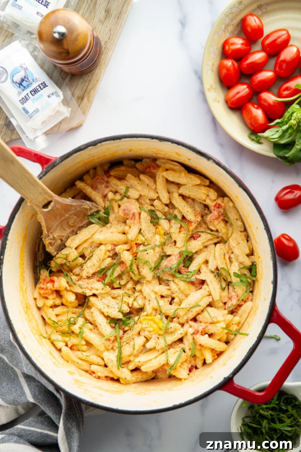 Mediterranean Goat Cheese Tomato Pasta 3 Juicy cherry tomatoes, creamy goat cheese, and lots of fresh basil dress up this easy goat cheese pasta that's ready in only 30 minutes.