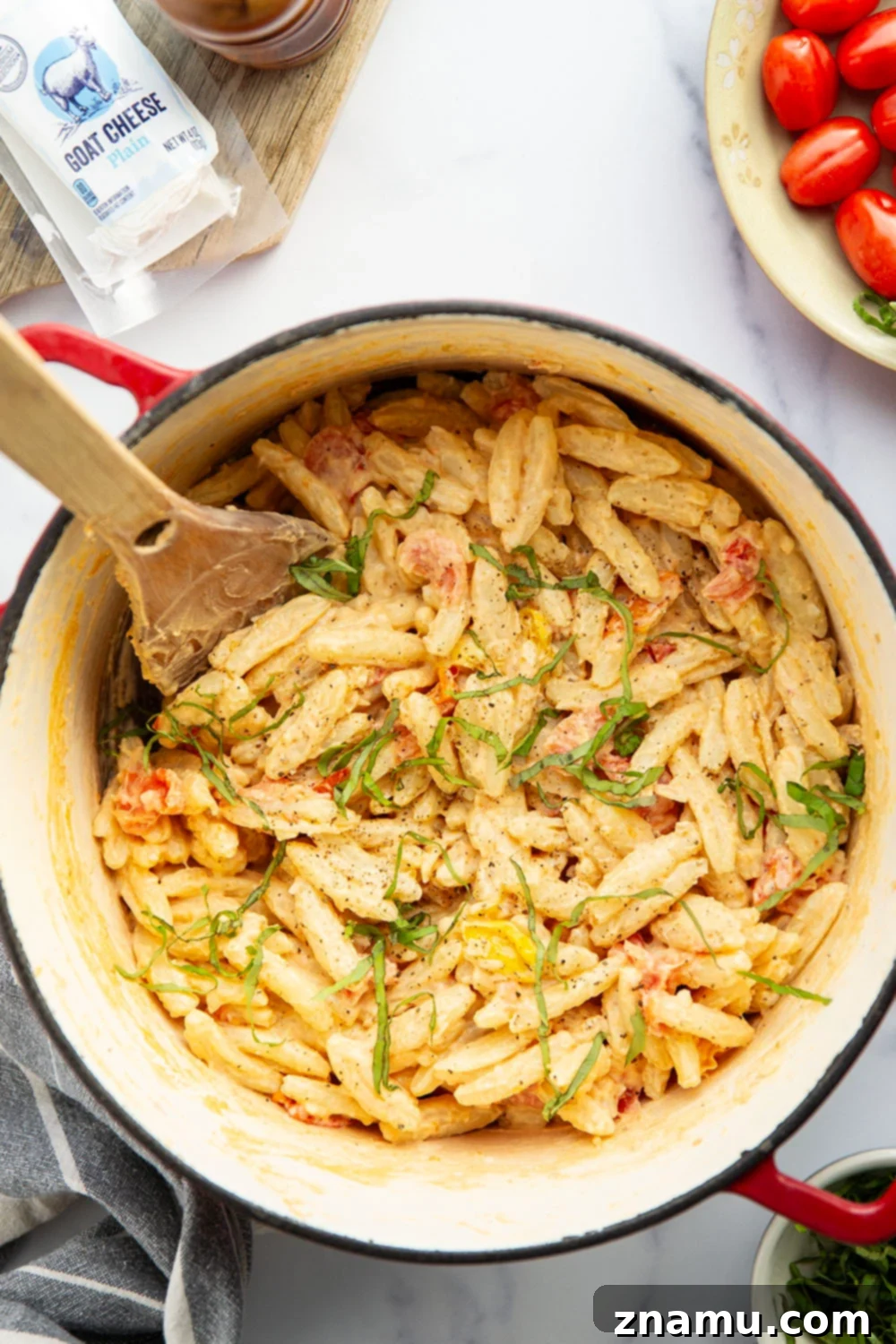 Mediterranean Goat Cheese Tomato Pasta 5 Juicy cherry tomatoes, creamy goat cheese, and lots of fresh basil dress up this easy goat cheese pasta that's ready in only 30 minutes.