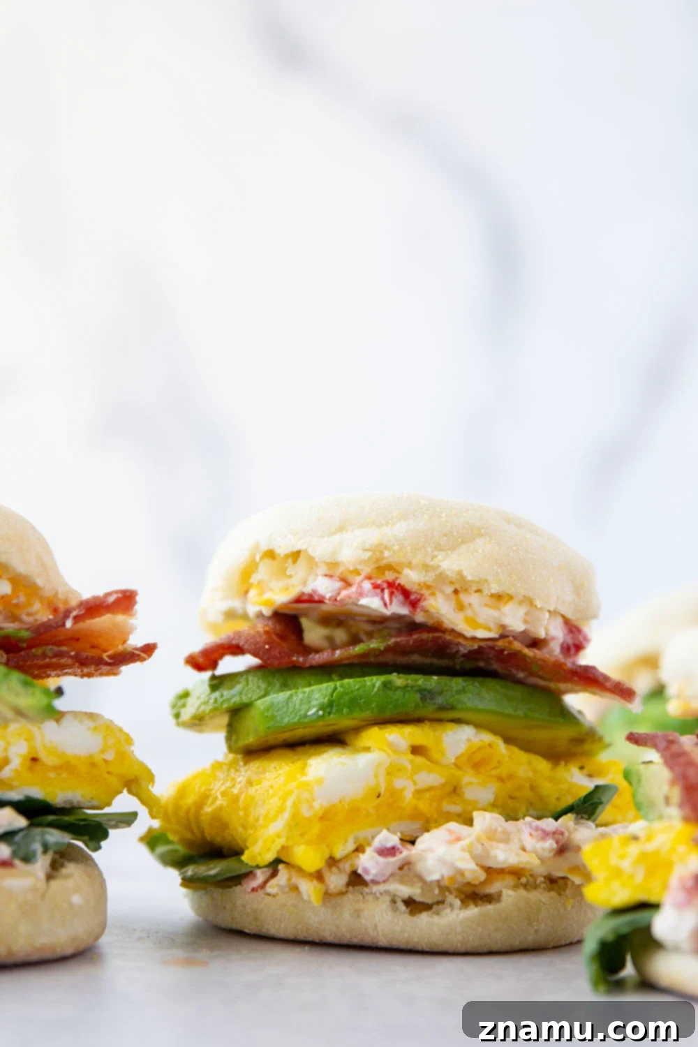 Southern Charm Pimento Breakfast 2 Flavorful homemade pimento cheese is the perfect breakfast sandwich addition alongside fluffy eggs, silky avocado, crispy bacon, and spring greens in this pimento cheese breakfast sandwich.