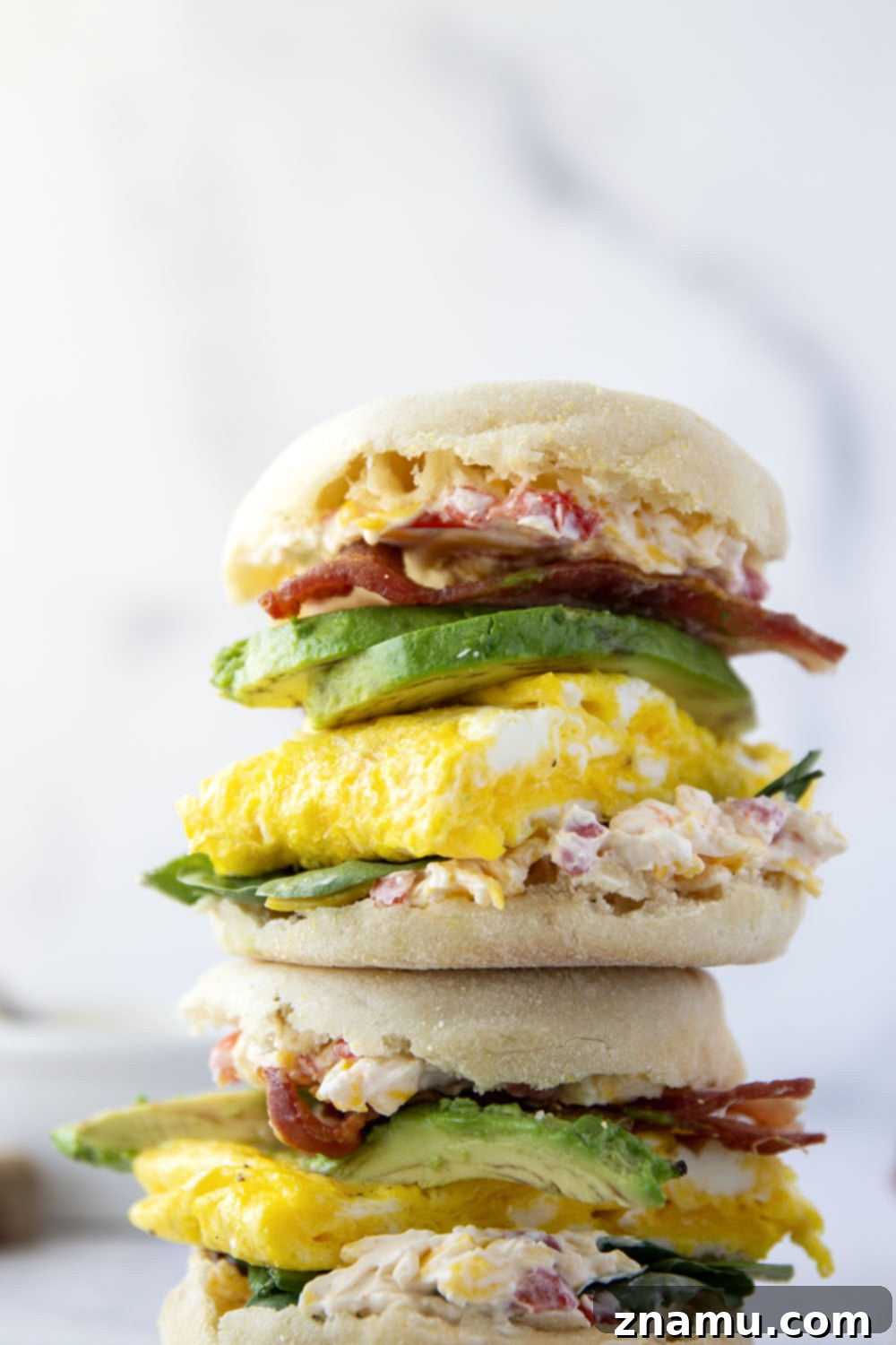 Southern Charm Pimento Breakfast 4 Flavorful homemade pimento cheese is the perfect breakfast sandwich addition alongside fluffy eggs, silky avocado, crispy bacon, and spring greens in this pimento cheese breakfast sandwich.