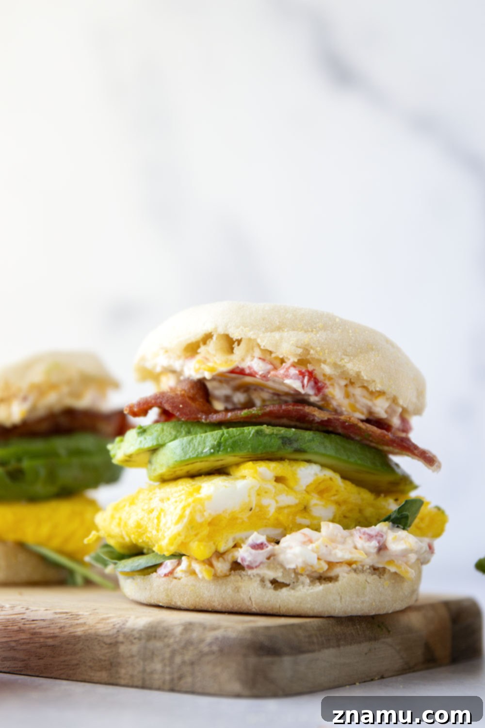 Southern Charm Pimento Breakfast 6 Flavorful homemade pimento cheese is the perfect breakfast sandwich addition alongside fluffy eggs, silky avocado, crispy bacon, and spring greens in this pimento cheese breakfast sandwich.