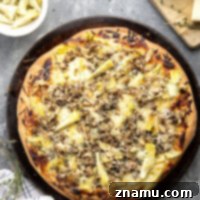 Gourmet Asiago Shiitake Mushroom Artichoke Pizza 8 This mushroom artichoke pizza features a creamy asiago alfredo sauce, buttery sauteed shiitake mushrooms, and lots of tender artichoke hearts.