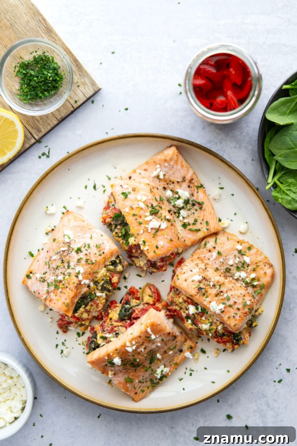 Feta and Roasted Red Pepper Stuffed Salmon 2 Flavorful Feta Stuffed Salmon with roasted red peppers and spinach, perfect for a quick and healthy dinner.