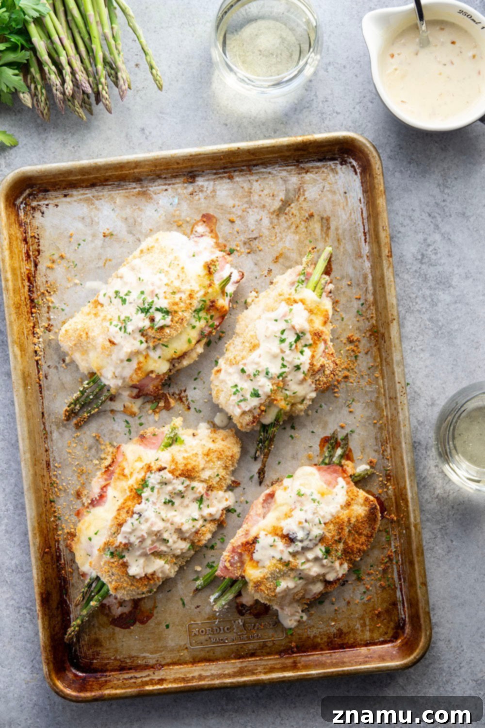 Verdant Cordon Bleu Chicken 3 Baked Chicken Cordon Bleu with Asparagus and Melted Swiss Cheese