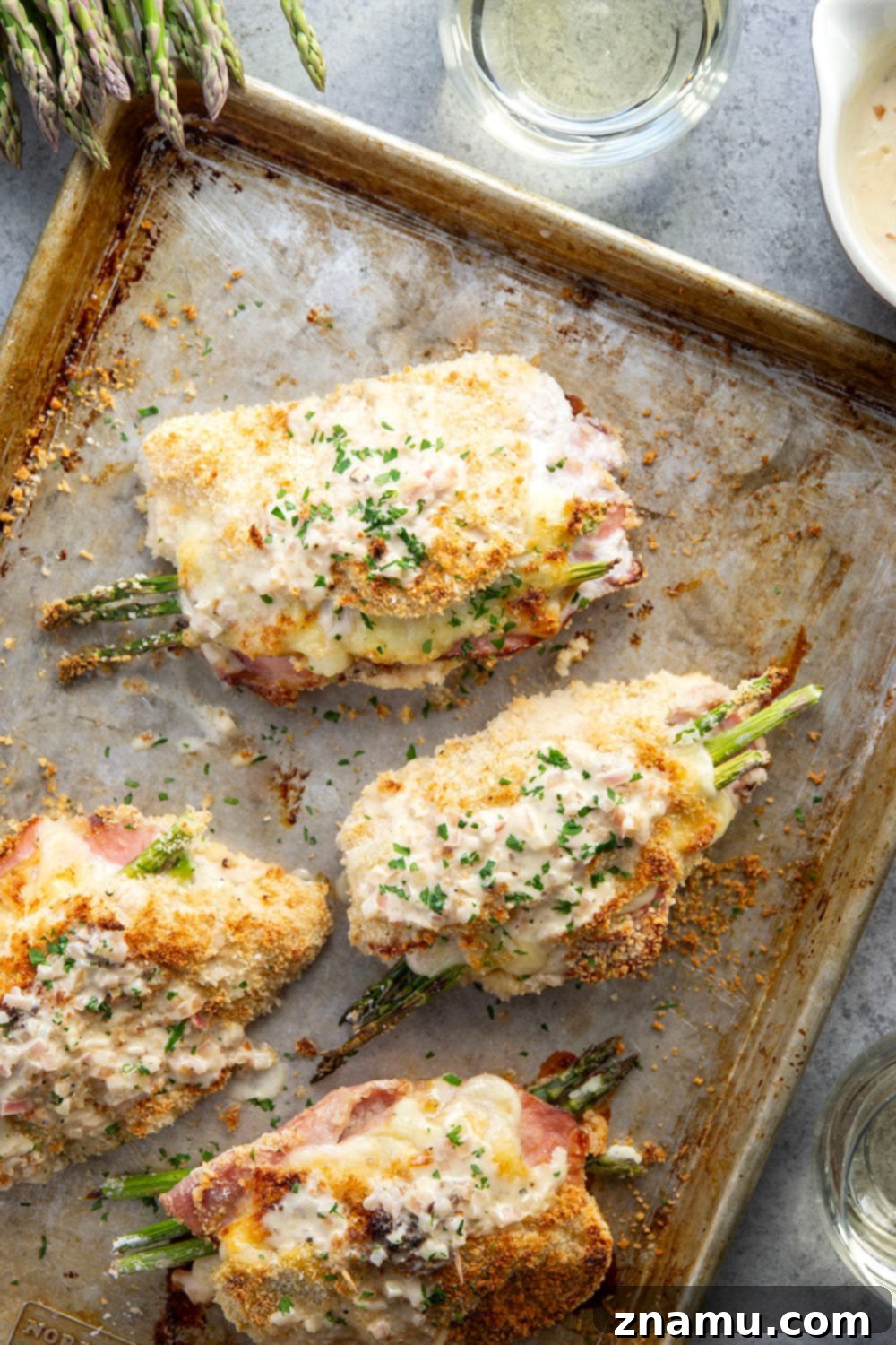 Verdant Cordon Bleu Chicken 5 Preparing chicken breasts for stuffing with ham, swiss, and asparagus