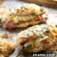 Verdant Cordon Bleu Chicken 8 Stuffed with a mix of tender asparagus spears, sliced ham, gooey swiss and rolled in crispy panko breadcrumbs and topped with a creamy white wine mustard sauce, this asparagus stuffed chicken cordon bleu wows at any occasion!