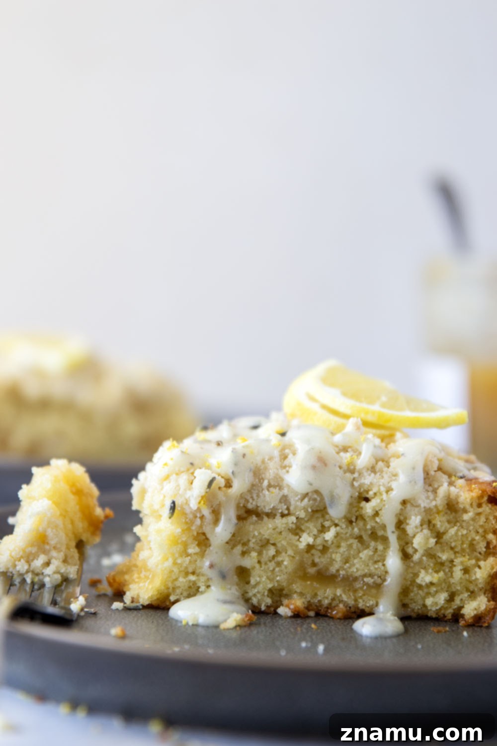Morning Lavender Lemon Cake 4 Close-up of the streusel topping and cream cheese glaze on a Lavender Lemon Coffee Cake, highlighting its delicious texture.