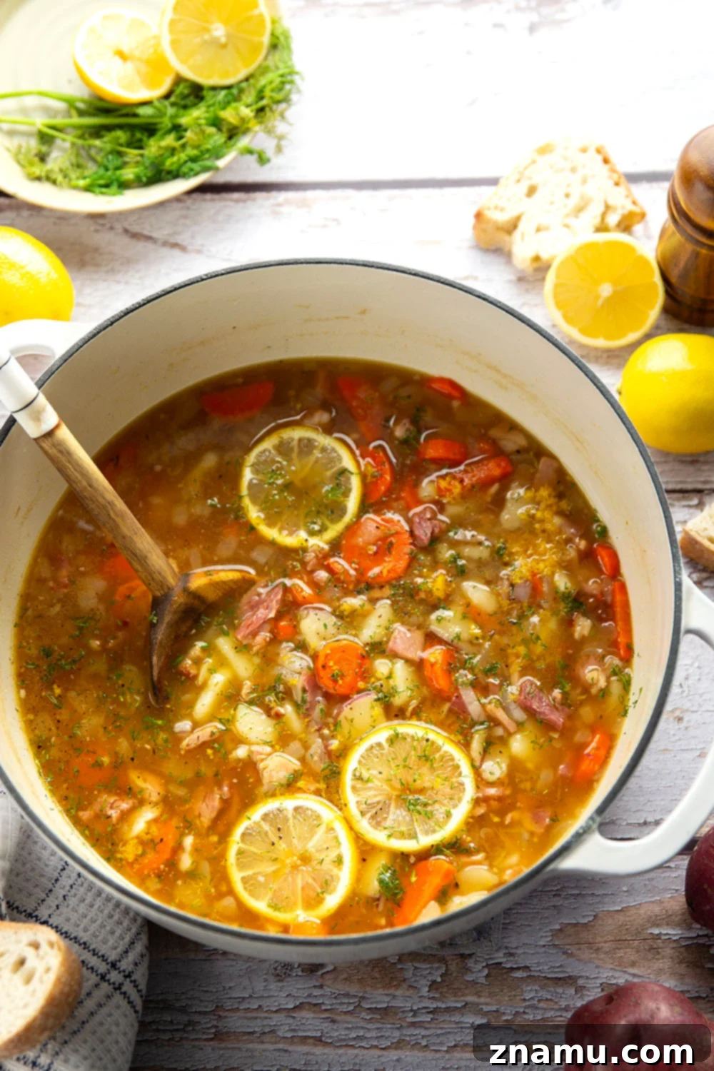 Bright Lemon Dill Ham Potato Soup 2 Comforting Lemon Dill Ham Potato Soup with crusty bread for dipping, perfect for spring.
