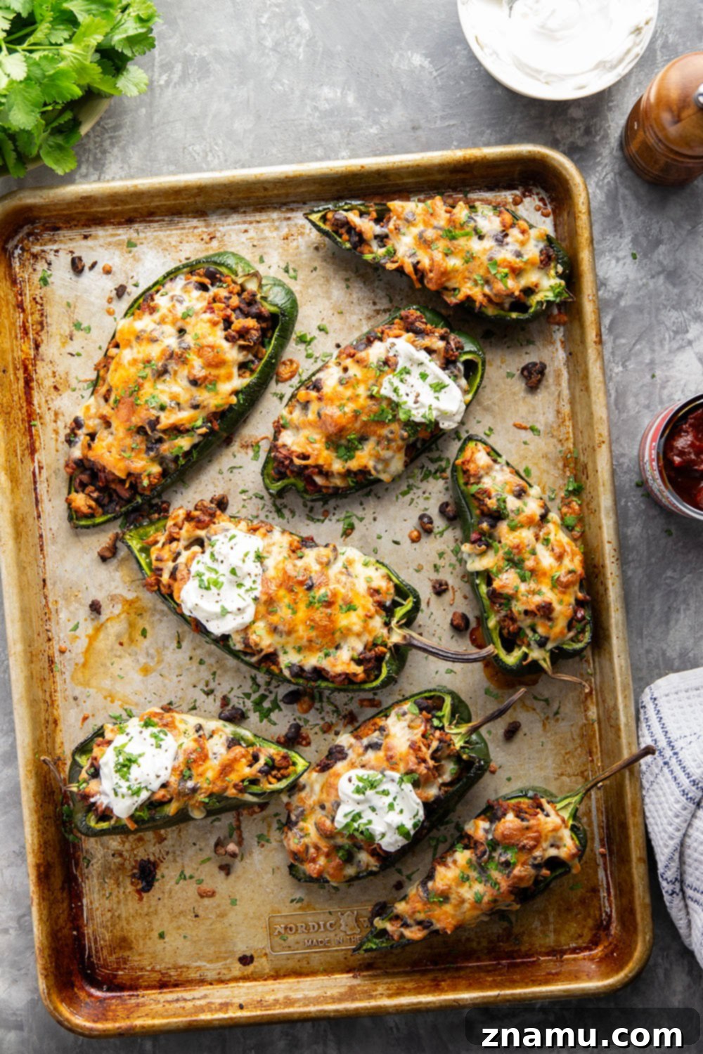 Zesty Chipotle Chicken Poblano Boats 3 Stuffed with a spicy chipotle chicken black bean filling and baked with lots of cheese on top, these chicken stuffed poblano peppers are an easy weeknight dinner that you can even prep ahead of time.