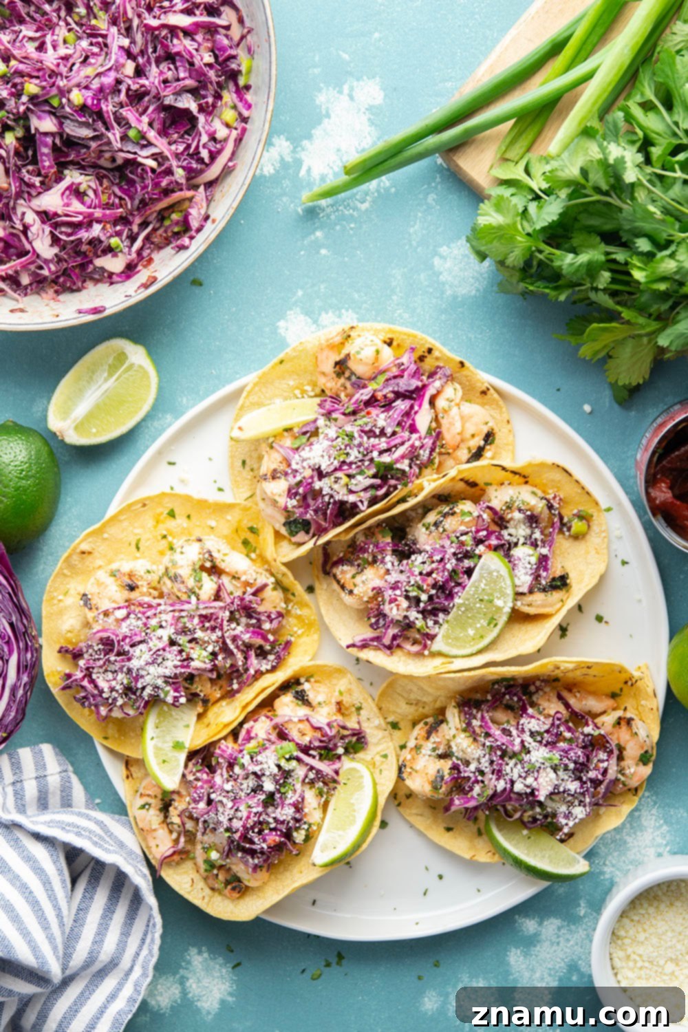 Sizzling Cilantro Lime Shrimp Tacos with Smoky Chipotle Slaw 2 Flavor-packed Cilantro Lime Grilled Shrimp Tacos with Spicy Chipotle Slaw, perfect for a quick, vibrant meal.