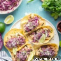 Juicy cilantro lime grilled shrimp and a spicy chipotle slaw are the perfect pairing in these flavor-packed cilantro lime shrimp tacos!