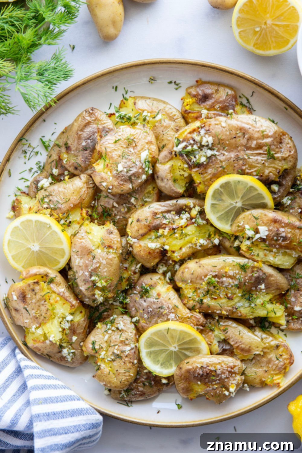 Crispy Lemon Dill Smashed Potatoes 5 These smashed fingerling potatoes feature roasted fingerling potatoes smashed and broiled until crispy and then drizzled with a fresh lemon dill sauce.