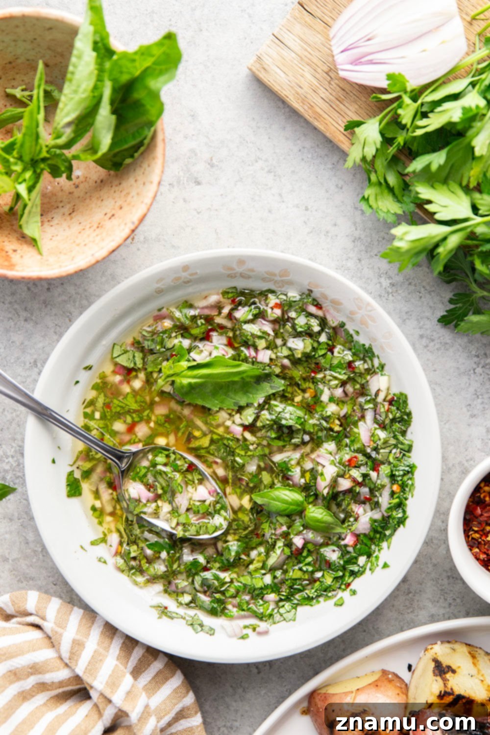 Grilled Red Potatoes with Chimichurri 4 Grilled to smoky, tender perfection and tossed in a fresh herby chimichurri sauce, these grilled chimichurri red potatoes go well with any summer meal!