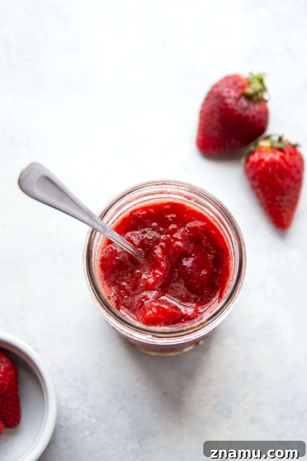 Luscious Homemade Strawberry Sauce 3 Close-up of fresh, ripe strawberries, the key ingredient for a vibrant homemade sauce.