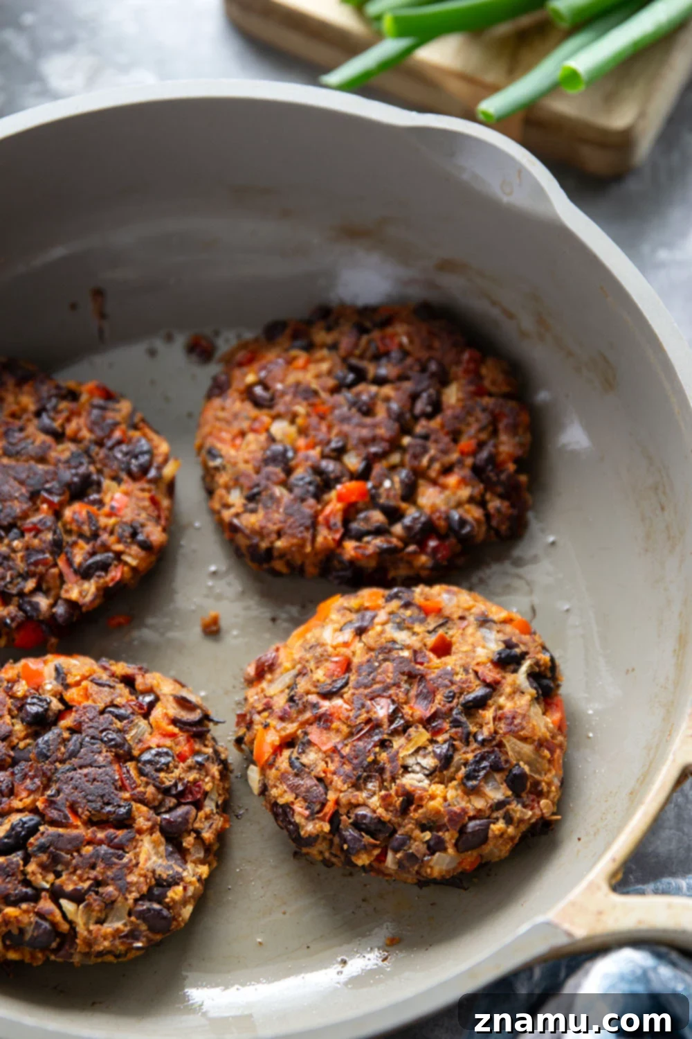 Spicy Chipotle Black Bean Burgers with Tangy Buttermilk Slaw 3 Smoky chipotle black bean burgers are packed full of spicy flavors and incredible in a warm toasted bun with lots of creamy buttermilk slaw piled on top.