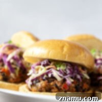 Spicy Chipotle Black Bean Burgers with Tangy Buttermilk Slaw 8 Smoky chipotle black bean burgers are packed full of spicy flavors and incredible in a warm toasted bun with lots of creamy buttermilk slaw piled on top.