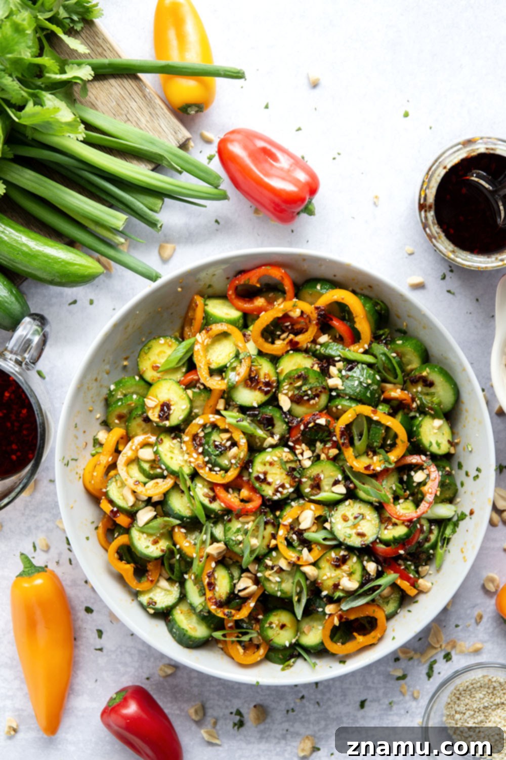Vibrant Peanut Chili Crisp Cucumber Salad 5 A jar of chili crisp, highlighting the key ingredient in the spicy cucumber salad, with its rich oil and crispy bits.