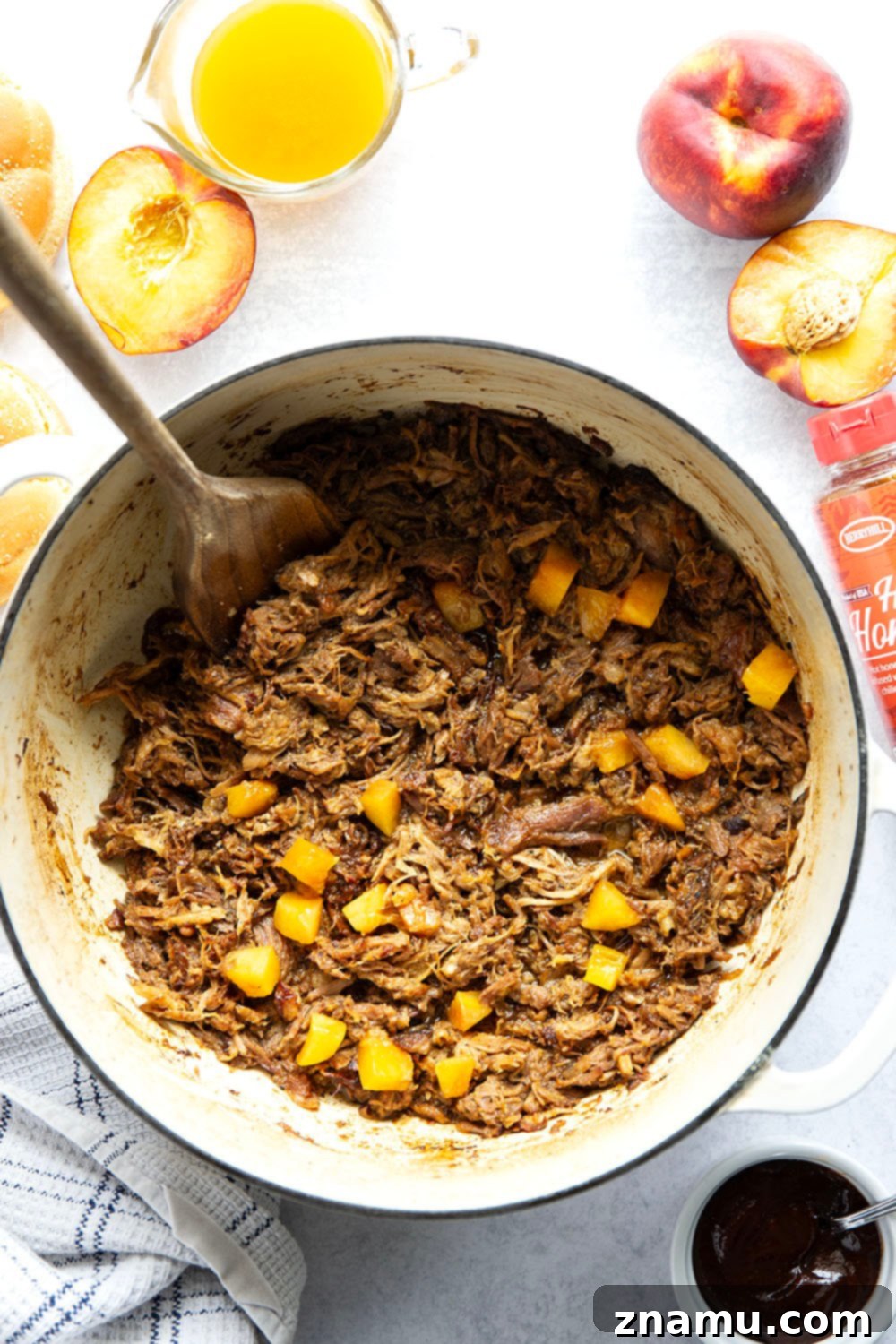 Sweet Heat Peach Pulled Pork 4 Slowly braised in sweet peaches and spicy hot honey, this peach hot honey pulled pork is fall-apart tender and makes one incredible sandwich!