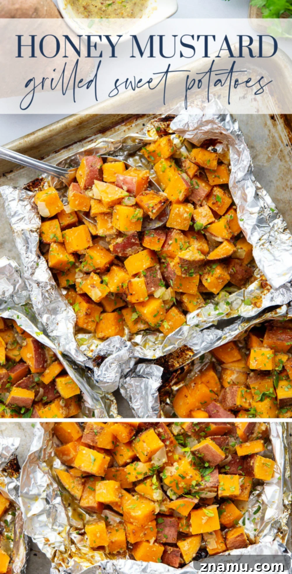 Large plate of honey mustard grilled sweet potatoes in foil, garnished with fresh herbs.