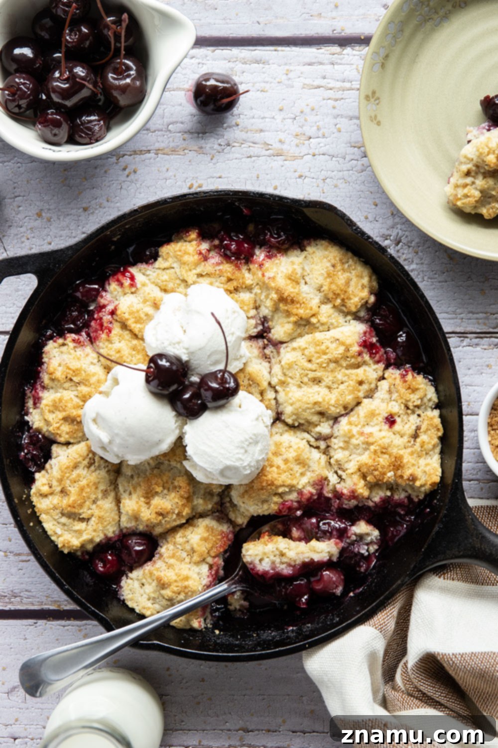 Sweet Cherry & Toasted Butter Cobbler 5 A bowl of fresh, ripe cherries, highlighting the main ingredient for the cobbler.