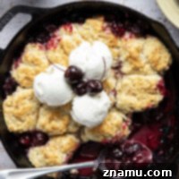 Sweet Cherry & Toasted Butter Cobbler 8 This cherry cobbler features a juicy fresh cherry filling baked with flaky browned butter biscuits on top. An incredible summer dessert warm from the oven with vanilla ice cream on top!