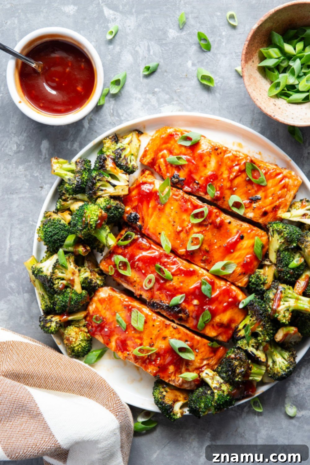 Smoky BBQ Salmon with Crisp Broccoli 2 Brushed in a sweet homemade barbecue sauce and grilled alongside broccoli, this grilled BBQ salmon is ready in only 30 minutes and great served alongside steamed rice.