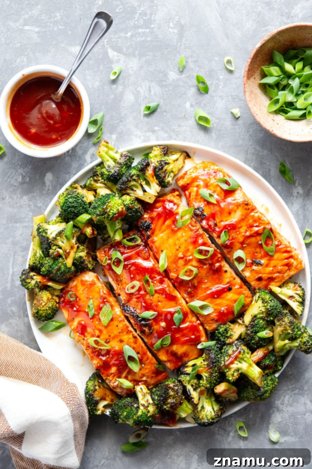 Smoky BBQ Salmon with Crisp Broccoli 4 Brushed in a sweet homemade barbecue sauce and grilled alongside broccoli, this grilled BBQ salmon is ready in only 30 minutes and great served alongside steamed rice.