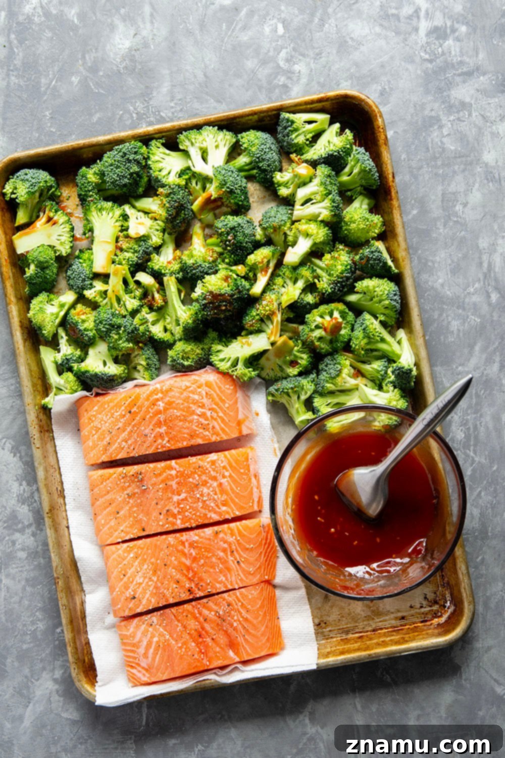 Smoky BBQ Salmon with Crisp Broccoli 5 Brushed in a sweet homemade barbecue sauce and grilled alongside broccoli, this grilled BBQ salmon is ready in only 30 minutes and great served alongside steamed rice.
