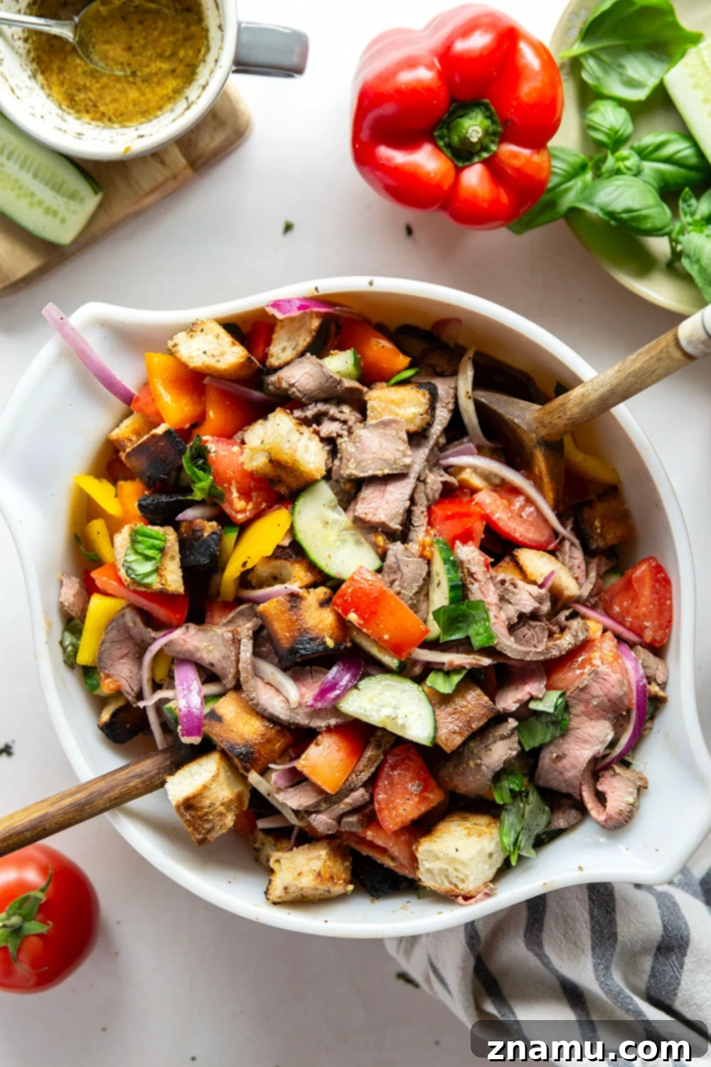Savory Grilled Steak Panzanella 4 Juicy grilled steak, charred bread cubes, juicy tomatoes, and lots of fresh basil make for the perfect summery meal in this grilled steak panzanella salad.