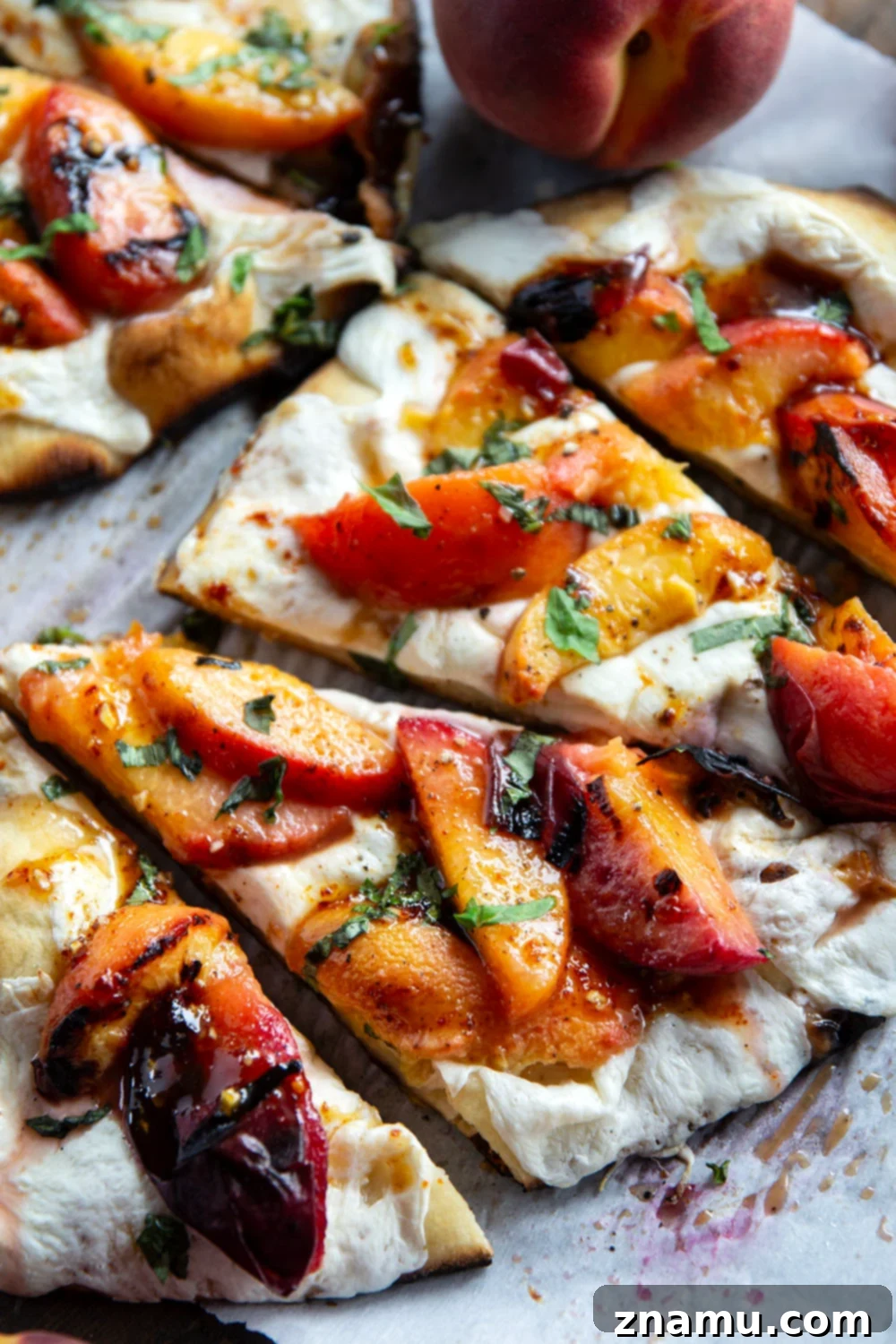 Blistered Peach & Hot Honey Flatbread 2 Smoky grilled peaches and drizzles of sweet and spicy homemade hot honey sauce are the perfect duo in this grilled peach flatbread.