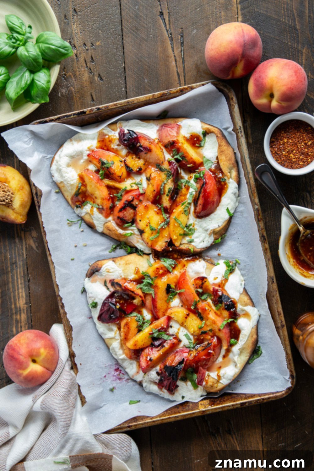Blistered Peach & Hot Honey Flatbread 3 Smoky grilled peaches and drizzles of sweet and spicy homemade hot honey sauce are the perfect duo in this grilled peach flatbread.