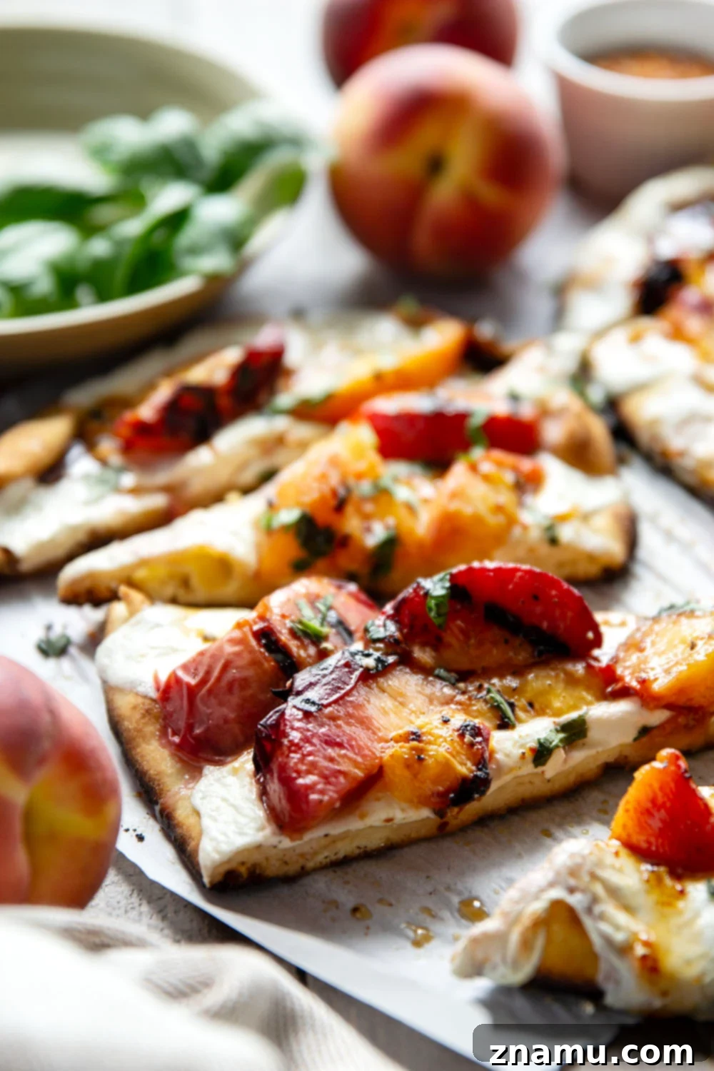 Blistered Peach & Hot Honey Flatbread 5 Smoky grilled peaches and drizzles of sweet and spicy homemade hot honey sauce are the perfect duo in this grilled peach flatbread.
