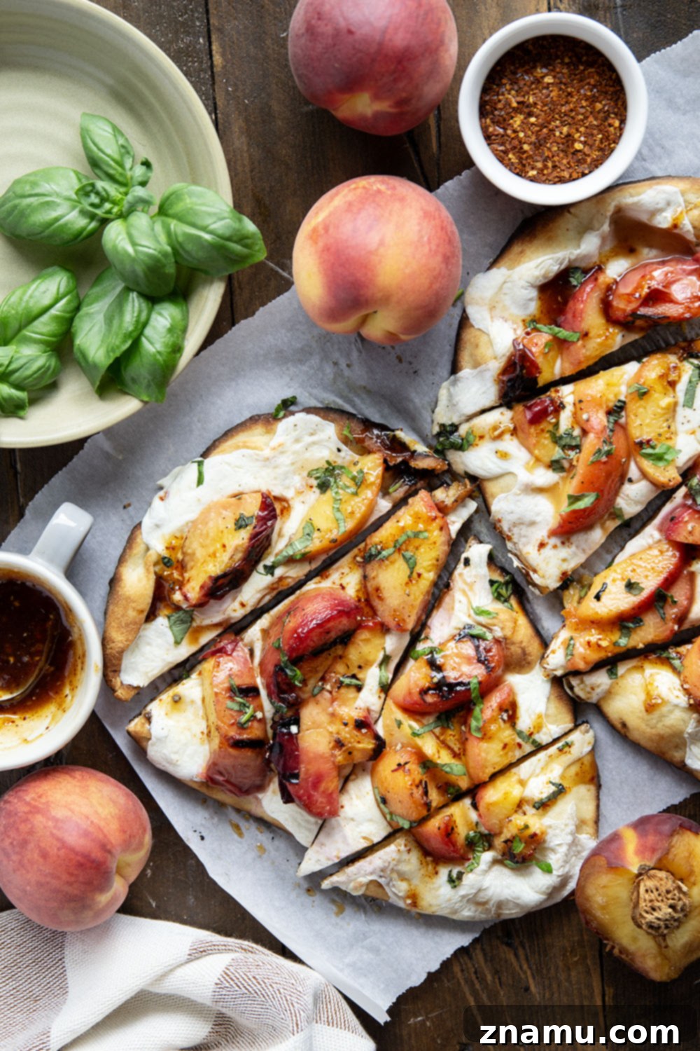 Blistered Peach & Hot Honey Flatbread 6 Smoky grilled peaches and drizzles of sweet and spicy homemade hot honey sauce are the perfect duo in this grilled peach flatbread.