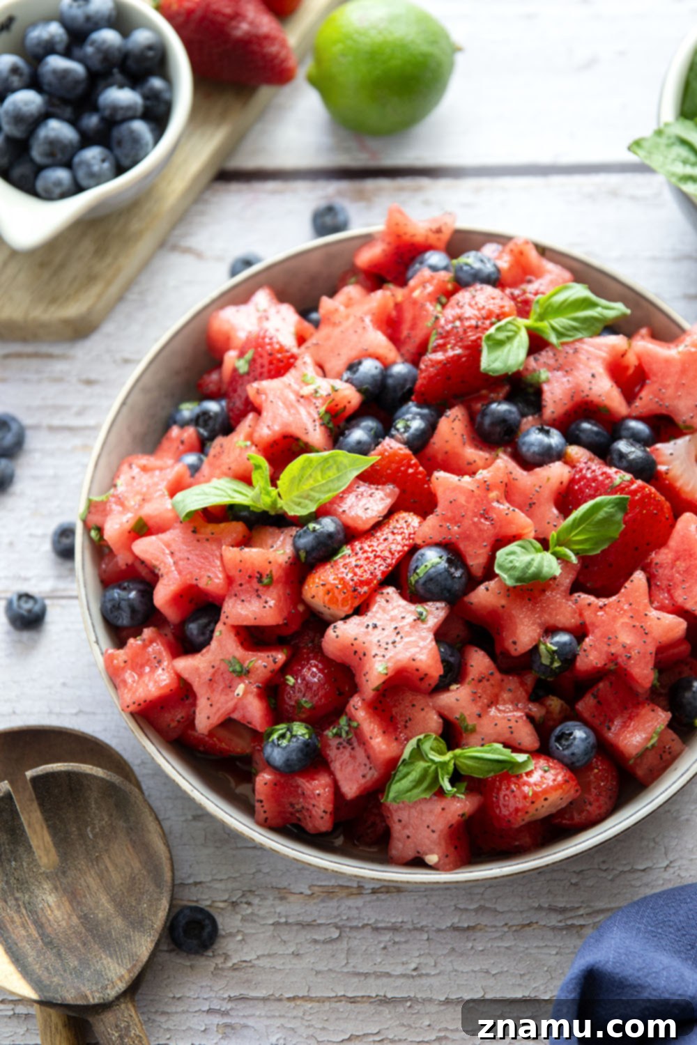 Patriotic Berry Medley 2 Fresh, tangy and loaded with tons of fruit, this 4th of July fruit salad will be a favorite side dish at any summer cookout you bring it to!