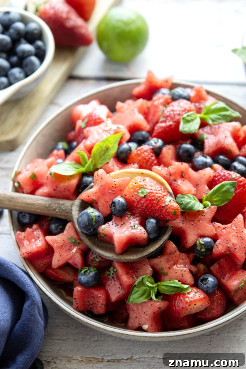 Patriotic Berry Medley 3 Fresh, tangy and loaded with tons of fruit, this 4th of July fruit salad will be a favorite side dish at any summer cookout you bring it to!