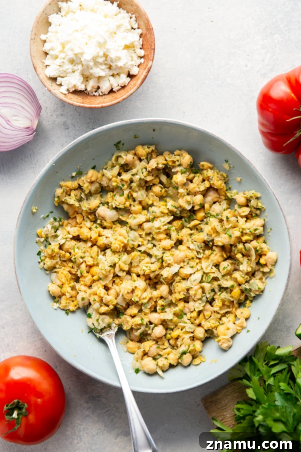 Sun-Drenched Chickpea Roll 3 Lemony herb smashed chickpeas and lots of fresh Mediterranean ingredients make for the best lunch in this Mediterranean chickpea wrap.