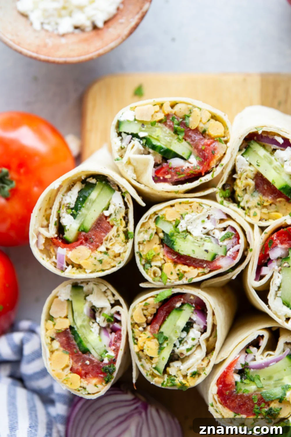 Sun-Drenched Chickpea Roll 6 Lemony herb smashed chickpeas and lots of fresh Mediterranean ingredients make for the best lunch in this Mediterranean chickpea wrap.