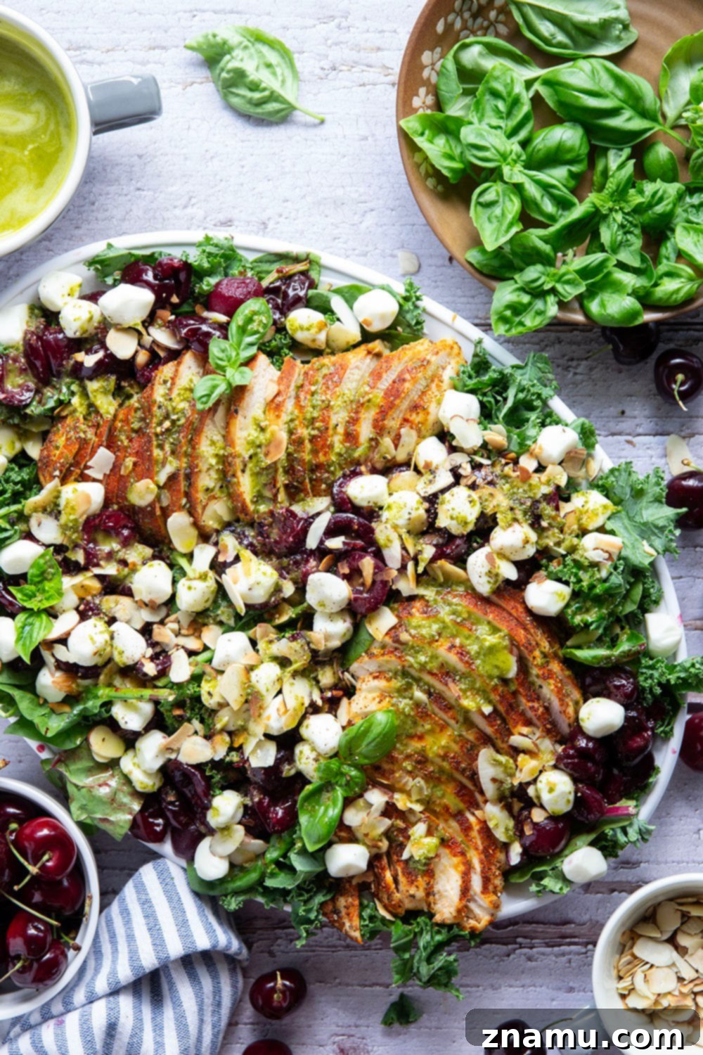 Roasted Cherry Chicken Salad with Bright Basil Lemon Dressing 5 Roasted chicken and cherries on a sheet pan, fresh out of the oven, ready to be added to the salad.