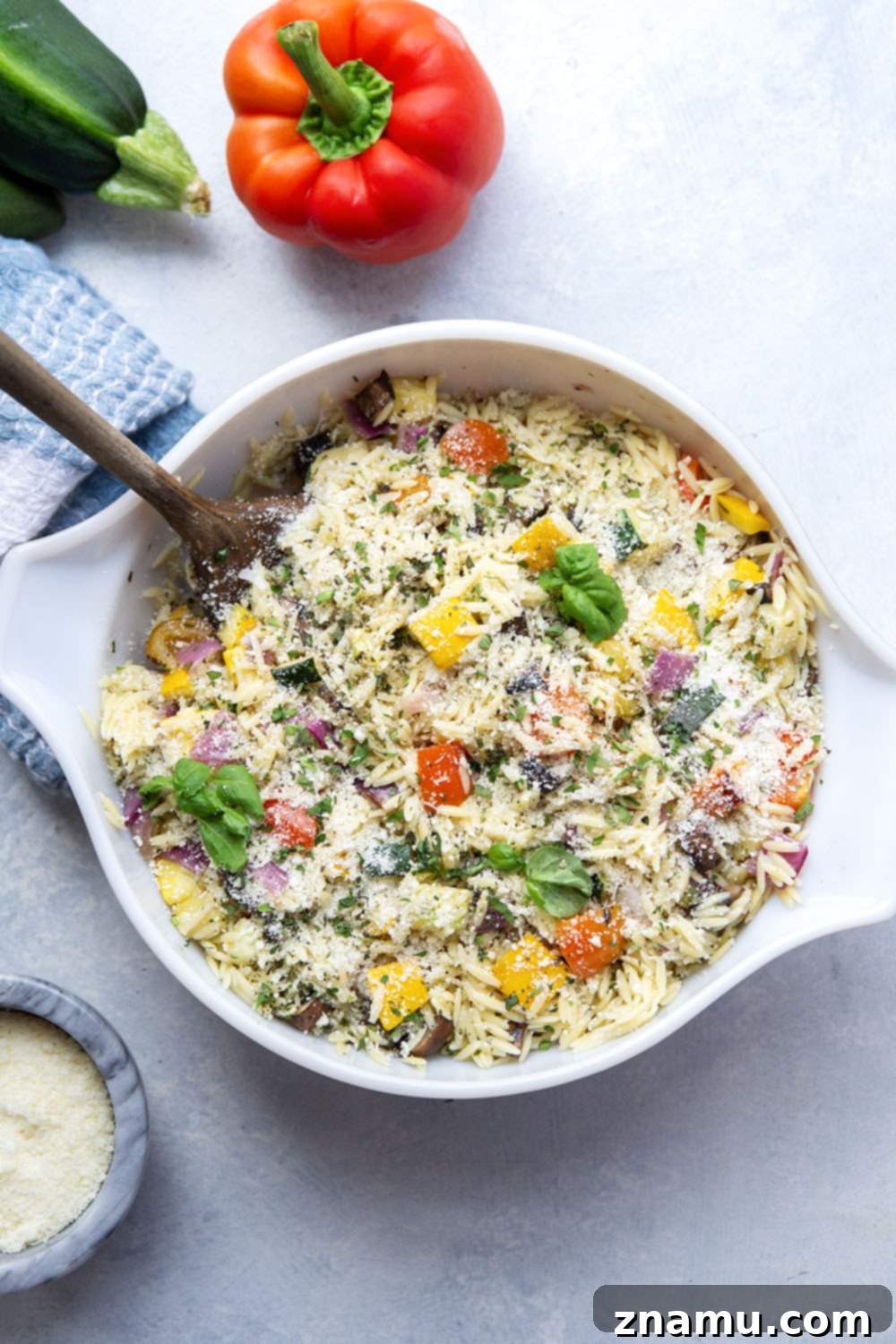 Charred Veggie Orzo Salad 6 Overhead shot of the complete grilled vegetable orzo salad, garnished with fresh basil.