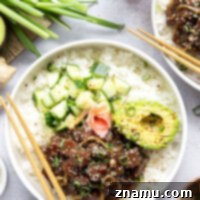 Marinated in a fresh ginger soy sauce and piled into bowls with lots of toppings, these ahi tuna poke bowls are quick to prep and better than any restaurant!