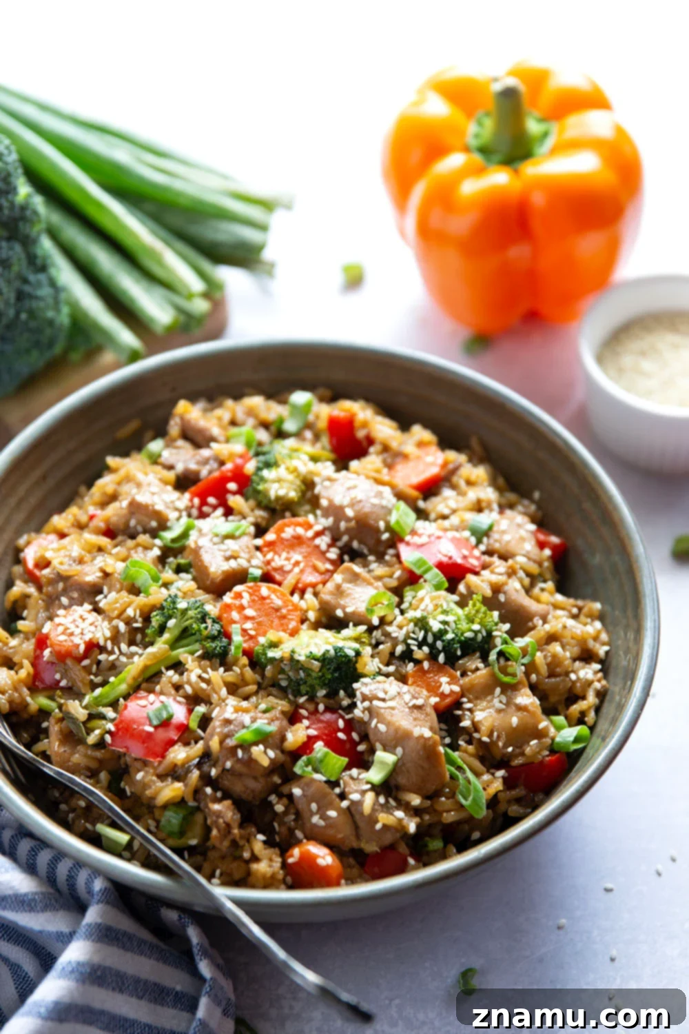 Delicious one-pot teriyaki chicken and rice ready to be served, showcasing fluffy rice, tender chicken, and colorful vegetables.