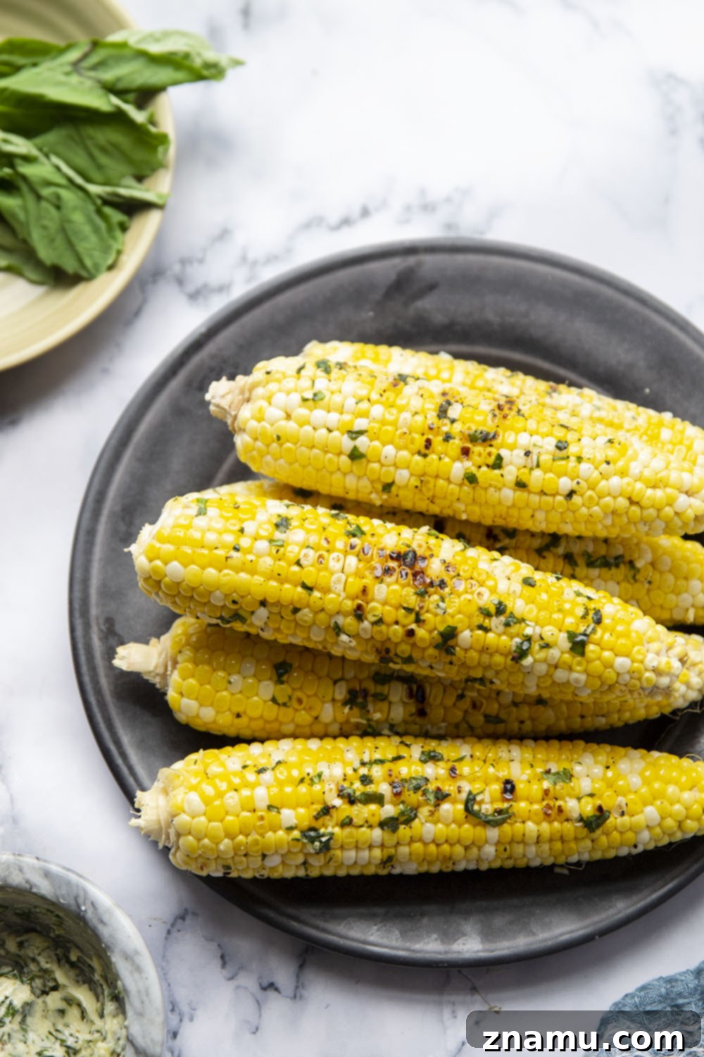 Irresistible Grilled Corn with Basil Butter 5 Cleaned corn on the cob, ready for grilling