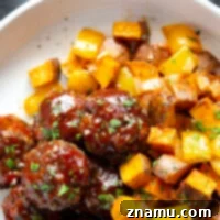 Baked in minutes on only one sheet pan, these honey BBQ meatballs are coated in a sweet and tangy homemade honey BBQ sauce and roasted alongside tender sweet potatoes.