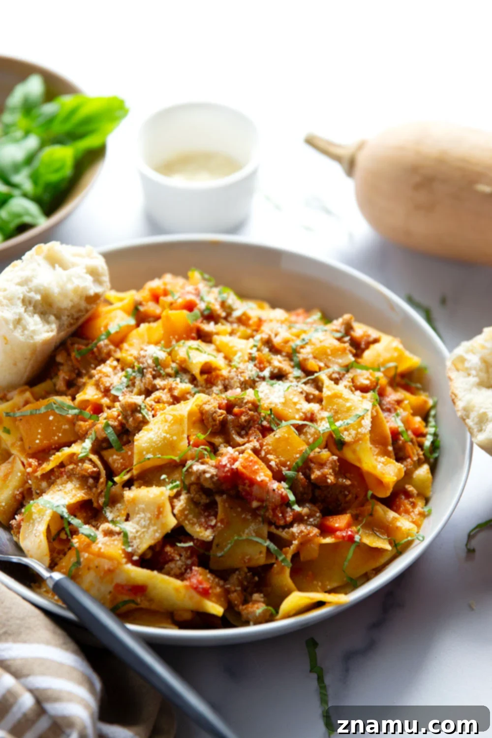 Golden Butternut Turkey Ragu 2 Butternut Squash Turkey Bolognese with tender butternut squash and ground turkey in a rich sauce simmered slowly for lots of flavor and tossed with tender pappardelle pasta.