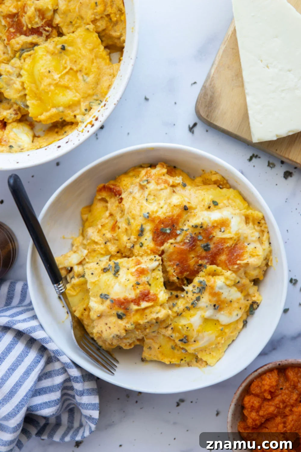 Golden Pumpkin Ravioli Bake 4 Baked Pumpkin Ravioli garnished with fresh sage