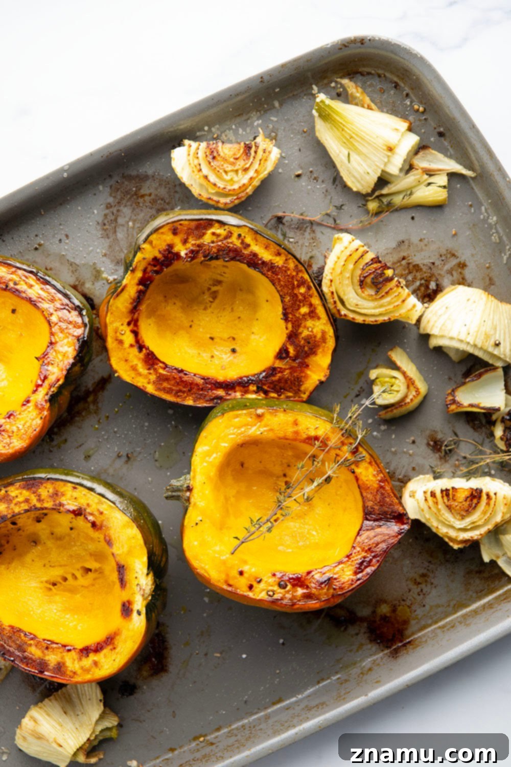 Velvety Roasted Fennel and Acorn Squash Soup 3 A vibrant bowl of Roasted Fennel Acorn Squash Soup, perfectly paired for a cozy fall meal.